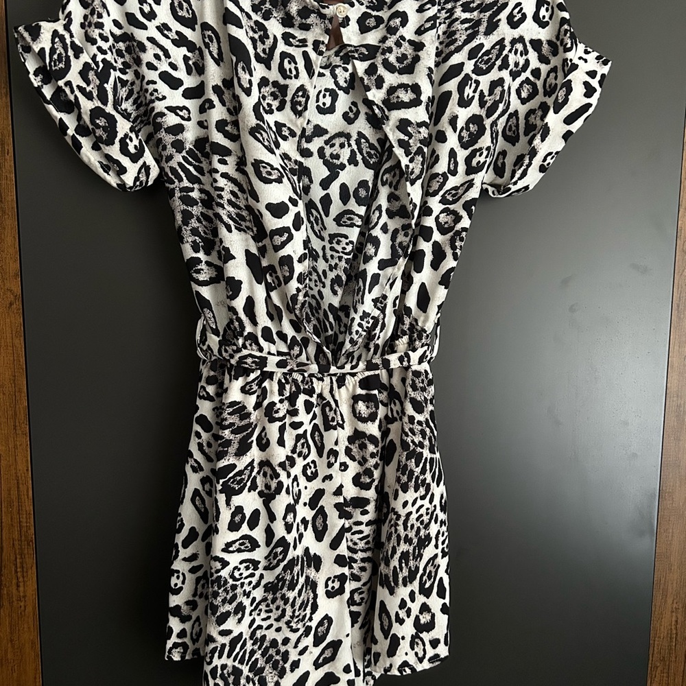 Leopard Romper, black and white, loose fit, lightweight, open in the back.